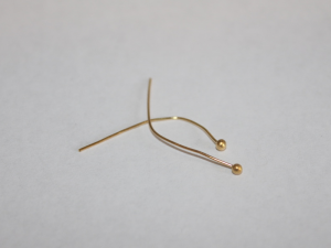 two gold head pins