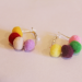 pom poms on hoop earrings