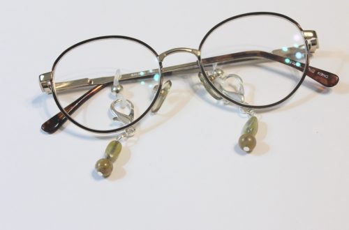glasses with charms attached