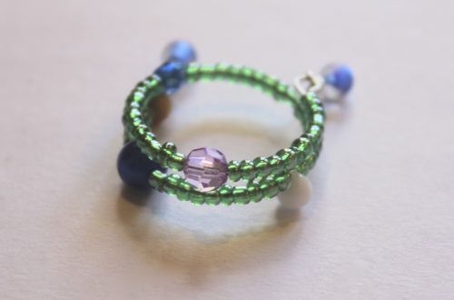the finished ring with focus on a feature bead