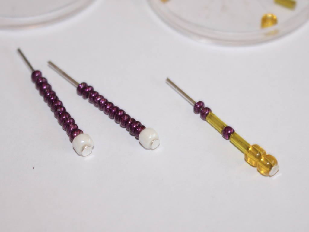 two leg pins and one arm pin