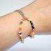 wearing the two bracelets interlocked on the wrist
