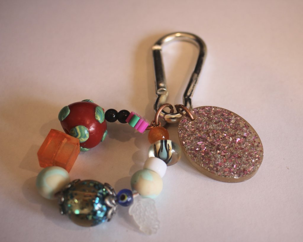 the resin charm added to the carabiner